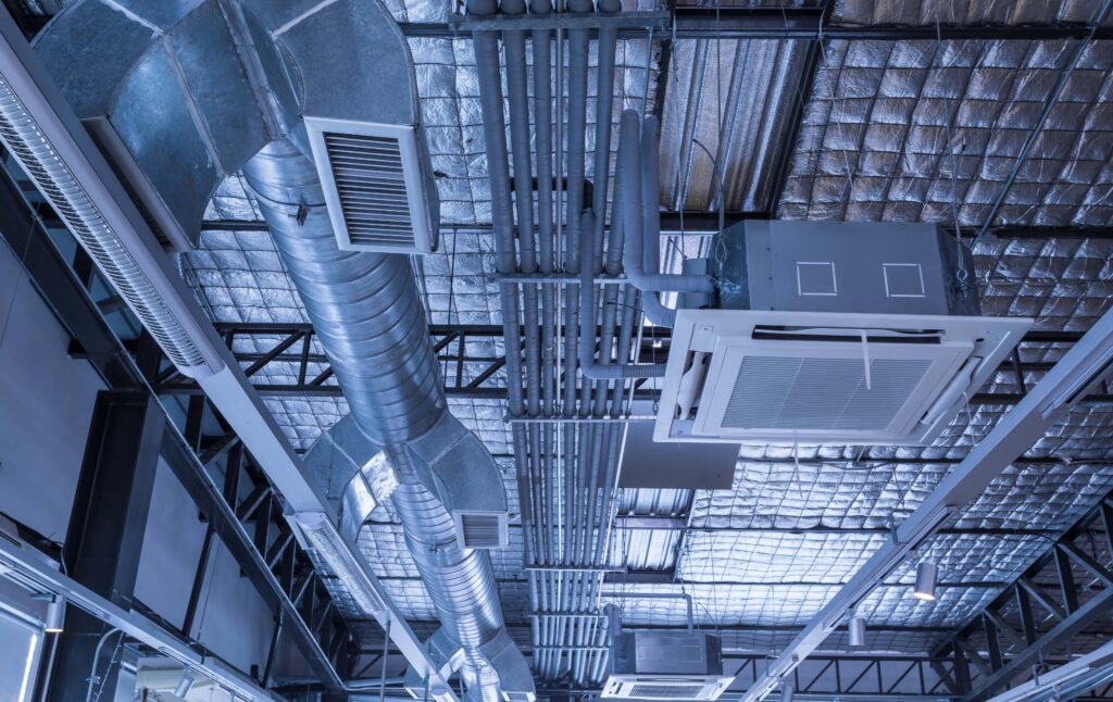 Modern Rooftop HVAC System with Large Metal Ductwork and Ventilation Components