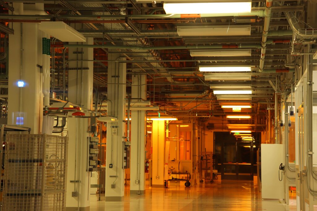 Industrial building Interior with Electrical Installations and Overhead Piping